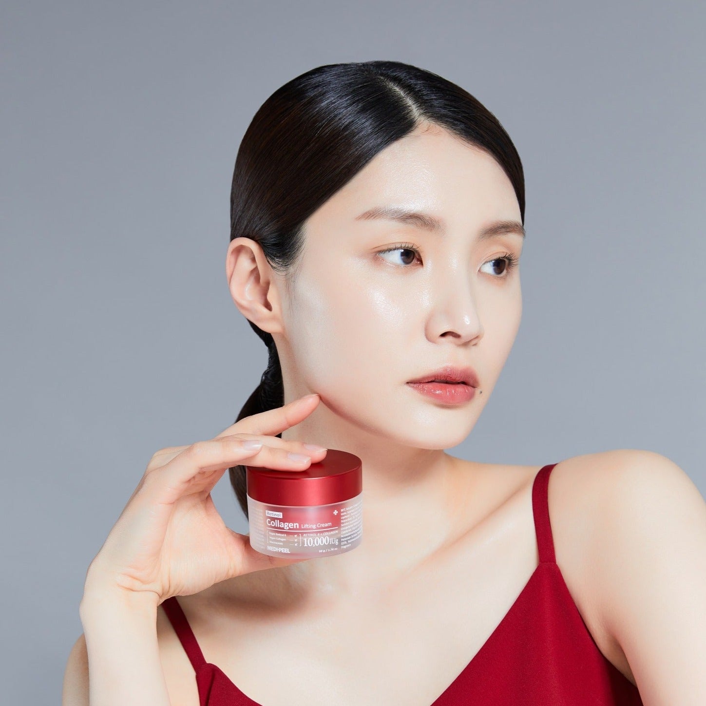 MEDIPEEL+ Retinol Collagen Lifting Cream 50ml face moisturizer with smooth, creamy texture and elegant packaging visible in the image.