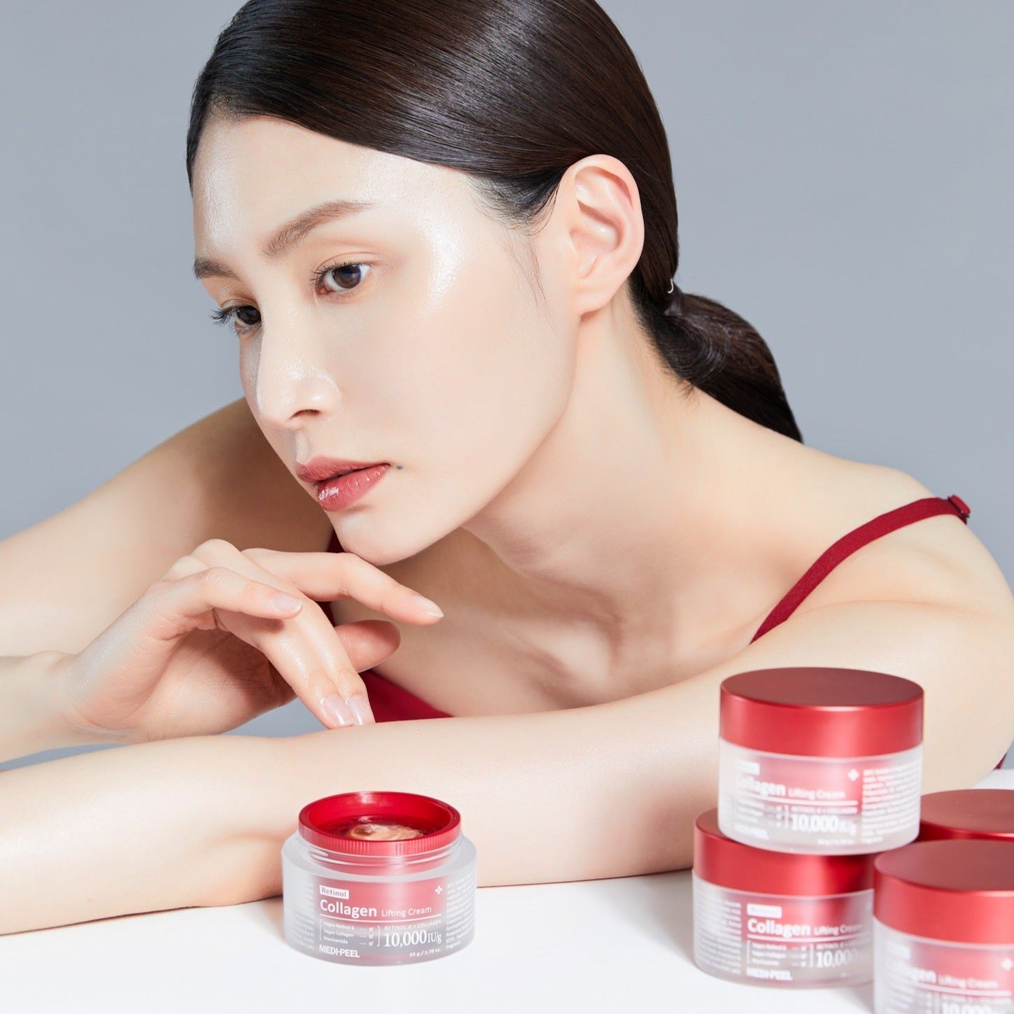 MEDIPEEL+ Retinol Collagen Lifting Cream 50ml face moisturizer with smooth, creamy texture and elegant packaging.