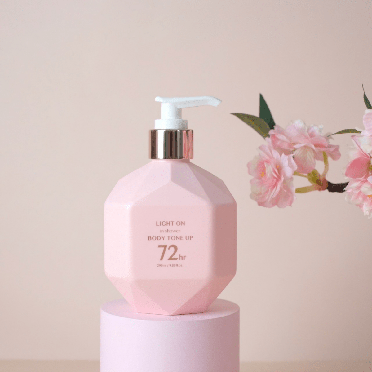B.O.M Light On In Shower Body Tone Up Cream in 290ml bottle, showing the product with label and pump dispenser.