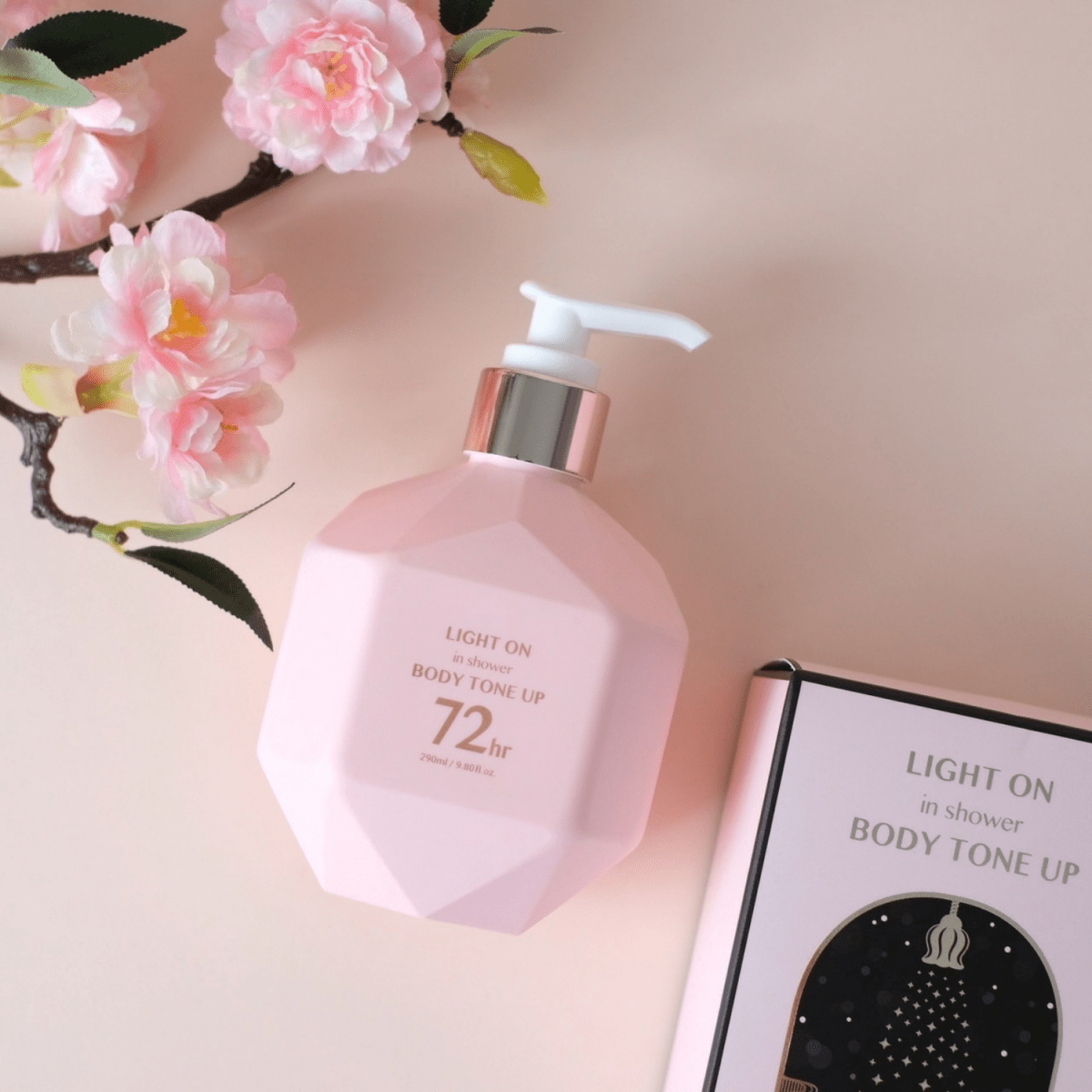 B.O.M Light On In Shower Body Tone Up Cream in 290ml bottle, smooth texture and lightening formula for radiant skin.