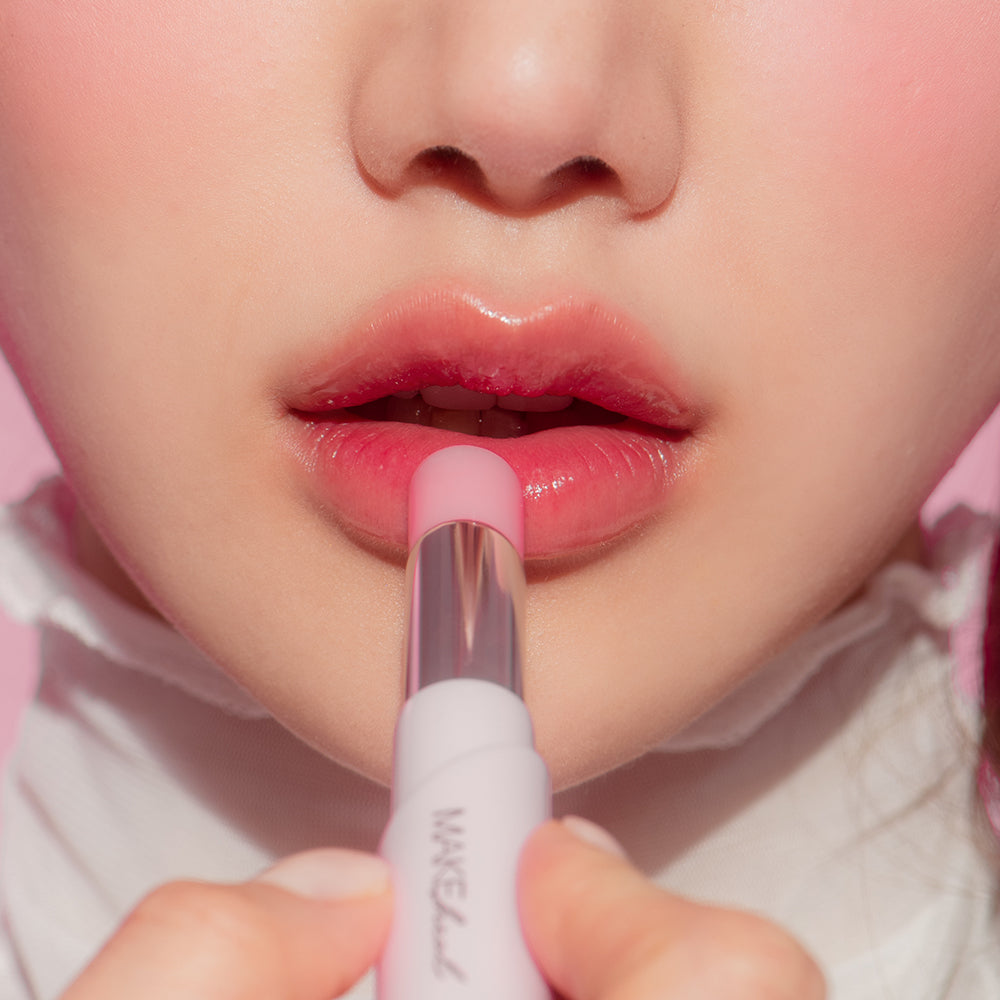 MAKEheal Collagen Tint Lip Glow showing a natural pink lip tint on smooth lips with a glossy finish.