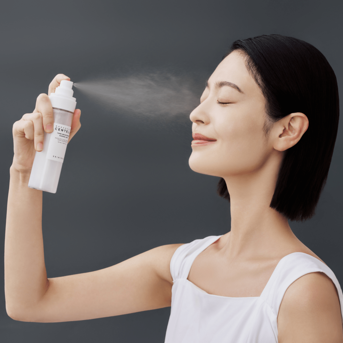 SKIN1004 Madagascar Centella Tone Brightening Aurora Mist 100ml spray bottle for face, soothing and refreshing skin care.