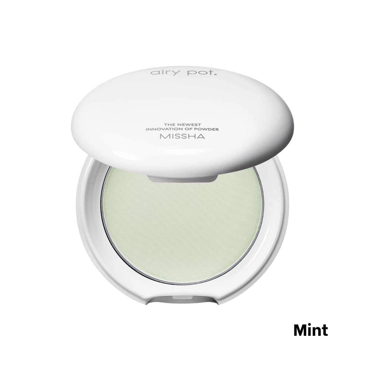 Missha Airy Pot pressed setting powder in mint shade, compact with smooth, pressed powder surface for a lightweight finish.