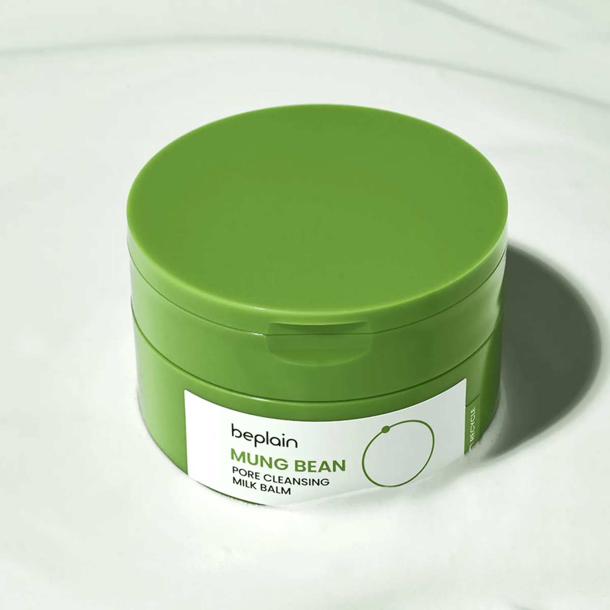 Beplain Mung Bean Pore Grinding Cleansing Balm 100ml with a jar of nourishing oil and balm cleanser for deep pore cleansing.