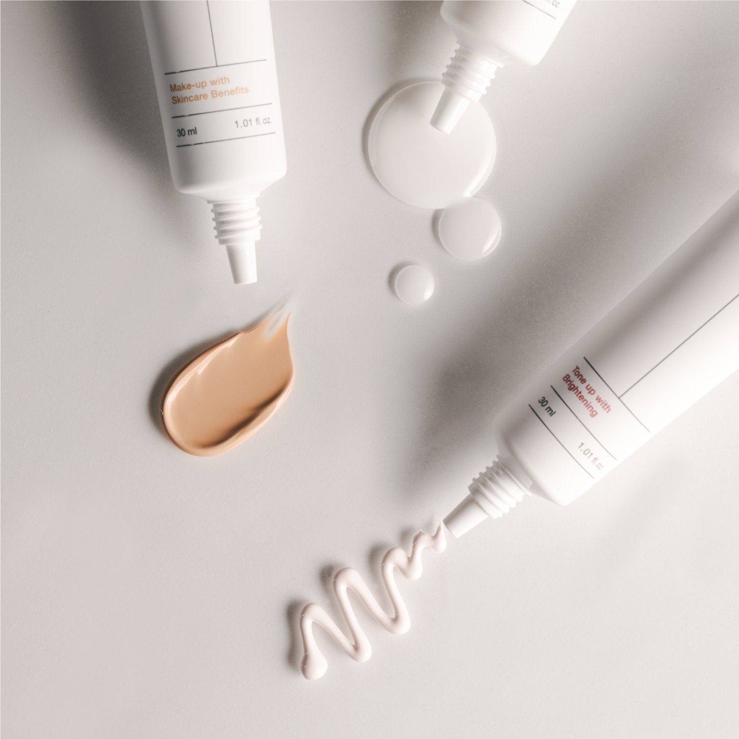 Biodance Skin Glow Tone Up Booster 30ml tone-up cream jar with a sleek, modern design and bright, glowing skin in the background.