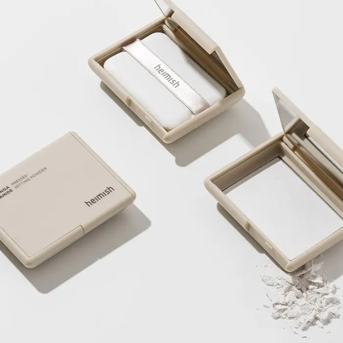 Heimish Moringa Ceramide Pressed Setting Powder 5g, close-up of the compact with smooth pressed powder inside.