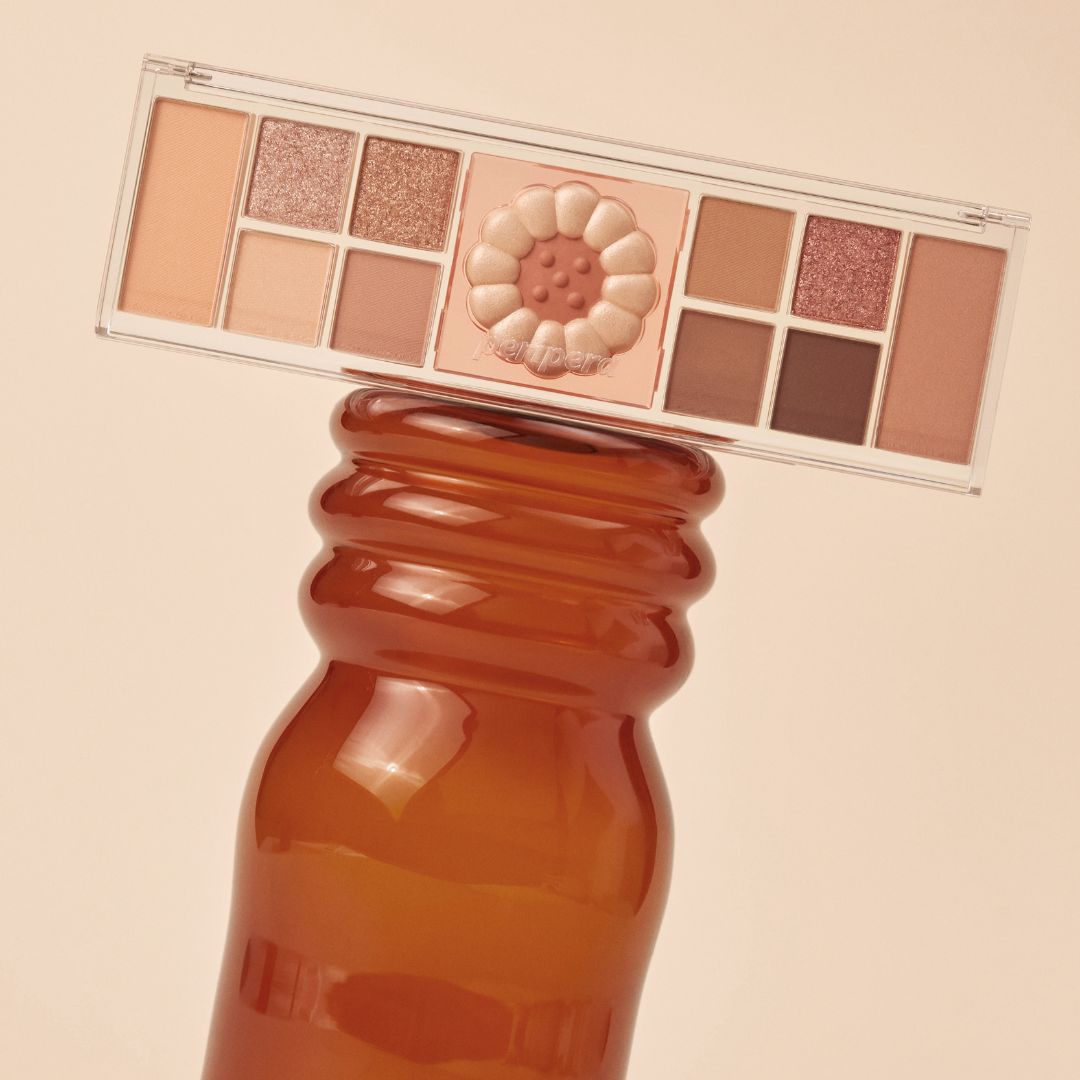 Peripera All Take Mood Like eyeshadow palette with colorful shades displayed in a sleek compact.