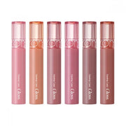 Rom&nd Glasting Color Gloss lip gloss in 8 vibrant shades, showing the glossy finish and colorful packaging.