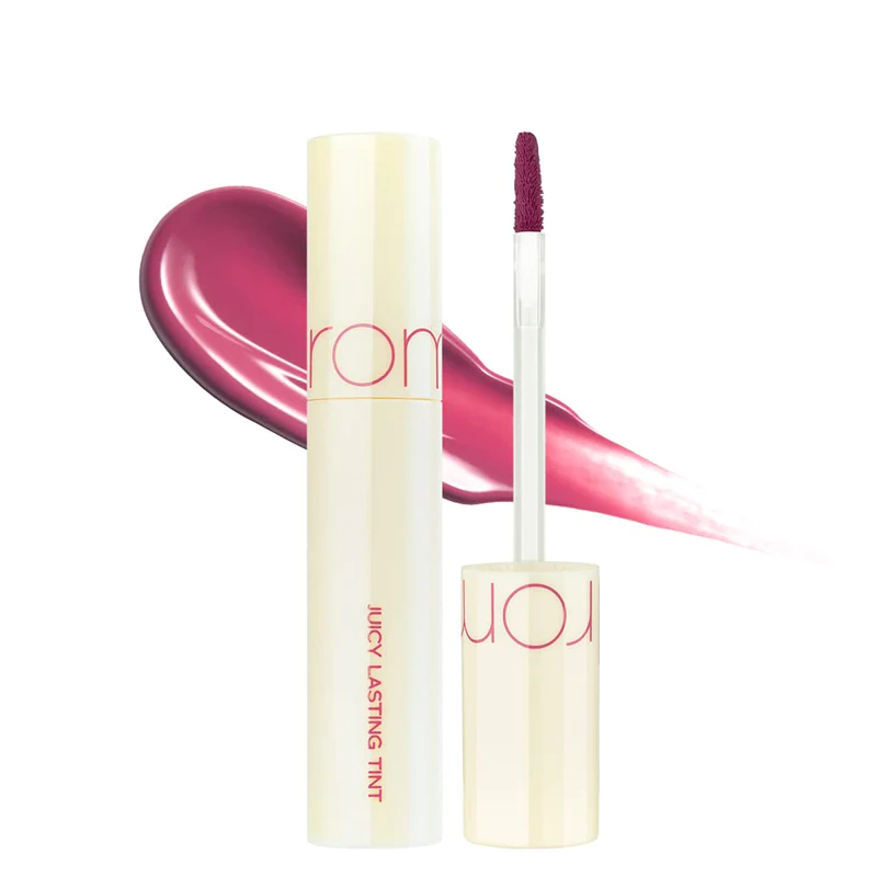 Rom&nd Juicy Lasting Tint in shade 28 Bare Fig, featuring a close-up of the lip tint tube with the product label visible.
