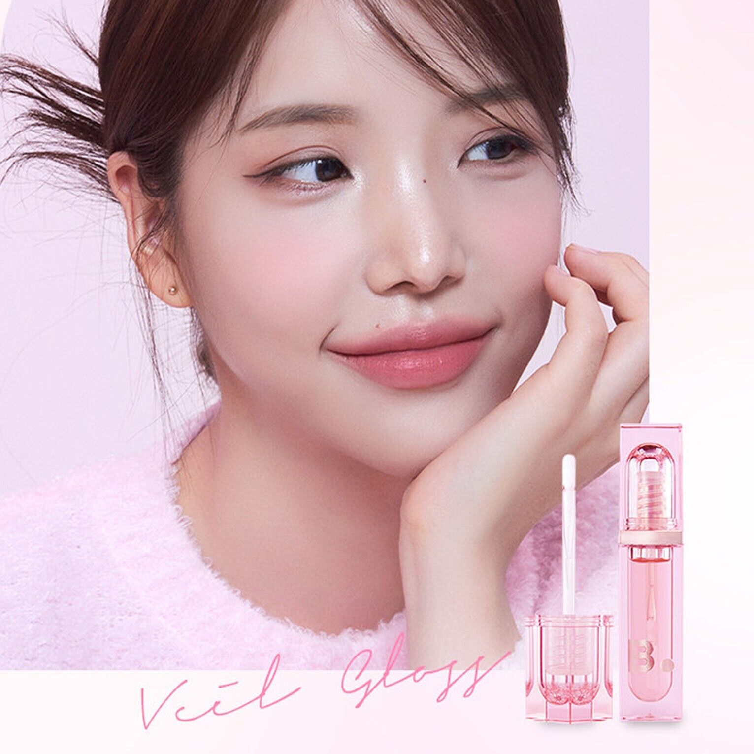 Banila Co B. By Banila Veil Gloss lip gloss with a shiny, clear finish and a smooth applicator brush.