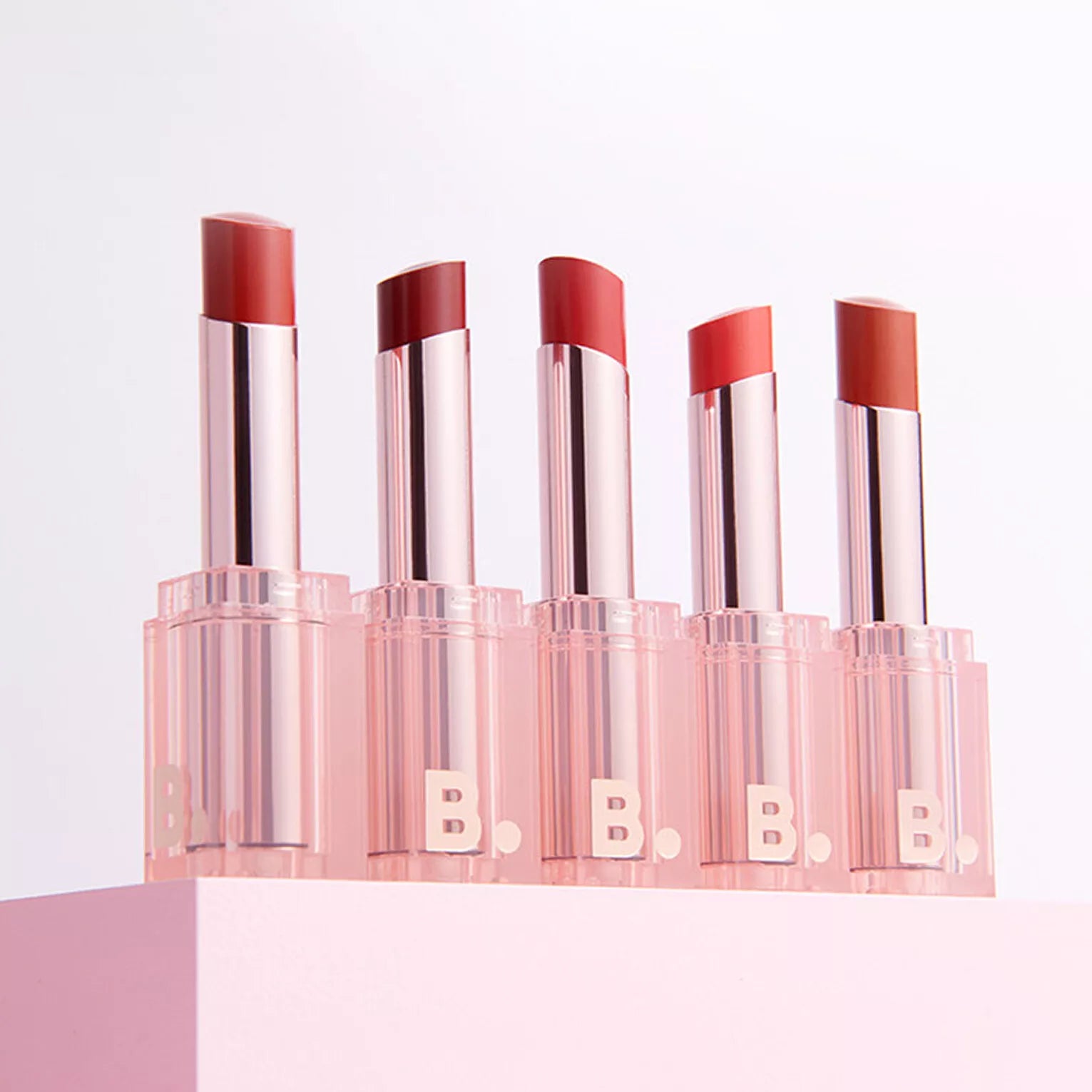 Banila Co B. By Banila Glow Veil Lipstick in a sleek tube with a soft pink shade, ready for a smooth, luminous lip look.