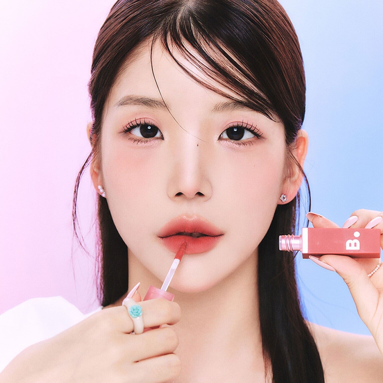 Banila Co B. By Banila Sheer Velvet Veil Lip Tint applied on lips with a soft, natural finish in a close-up shot