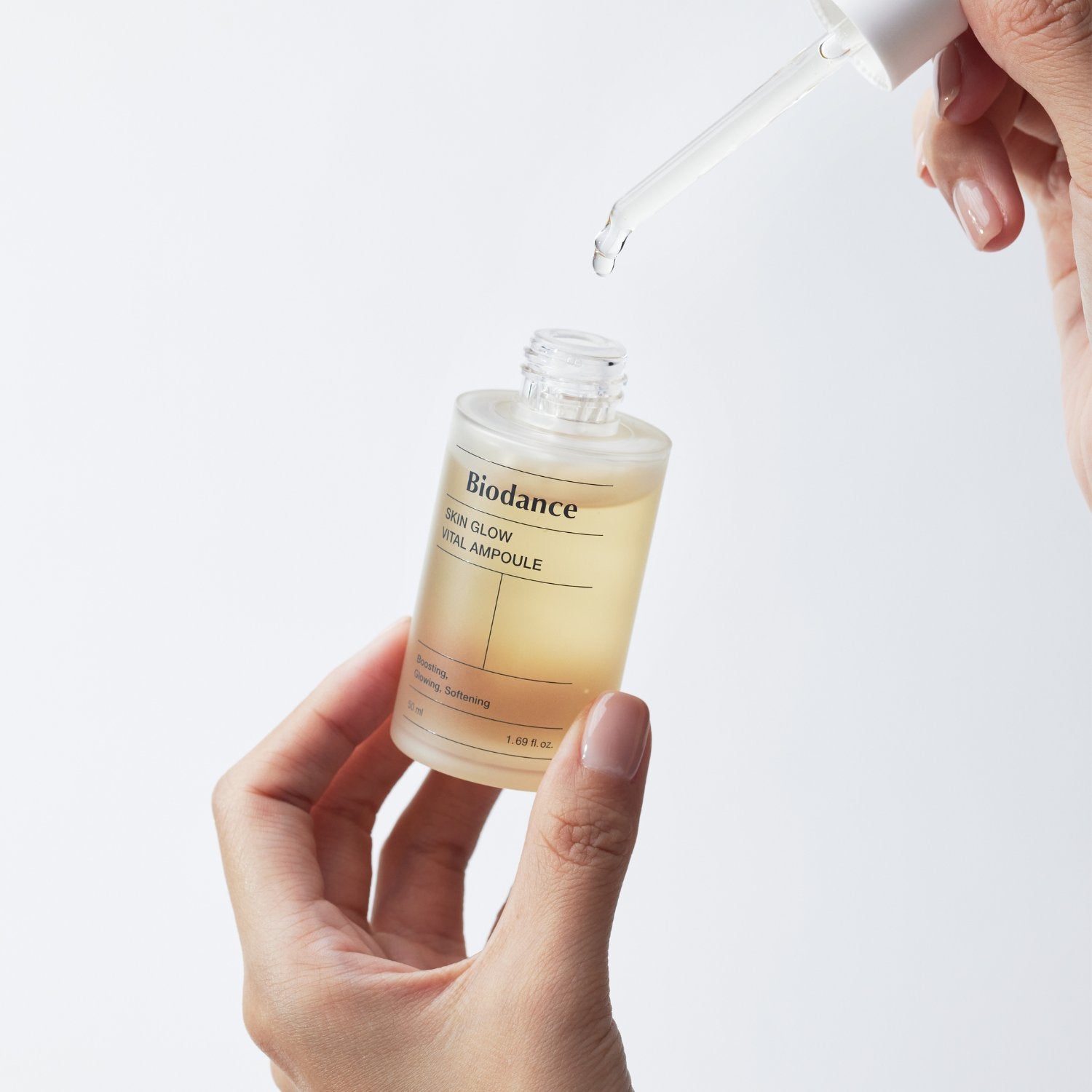 Biodance Skin Glow Vital Ampoule 50ml bottle with dropper for brightening and skin hydration in a clear glass container.