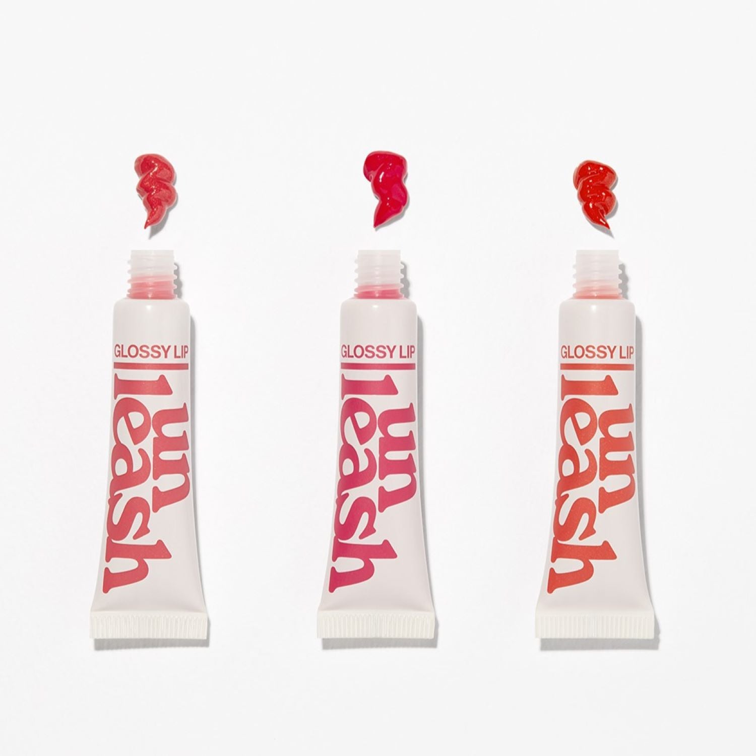 Unleashia Non Sticky Dazzle Tint lip tint in three vibrant colors, featuring a smooth, glossy finish and natural lip enhancement.
