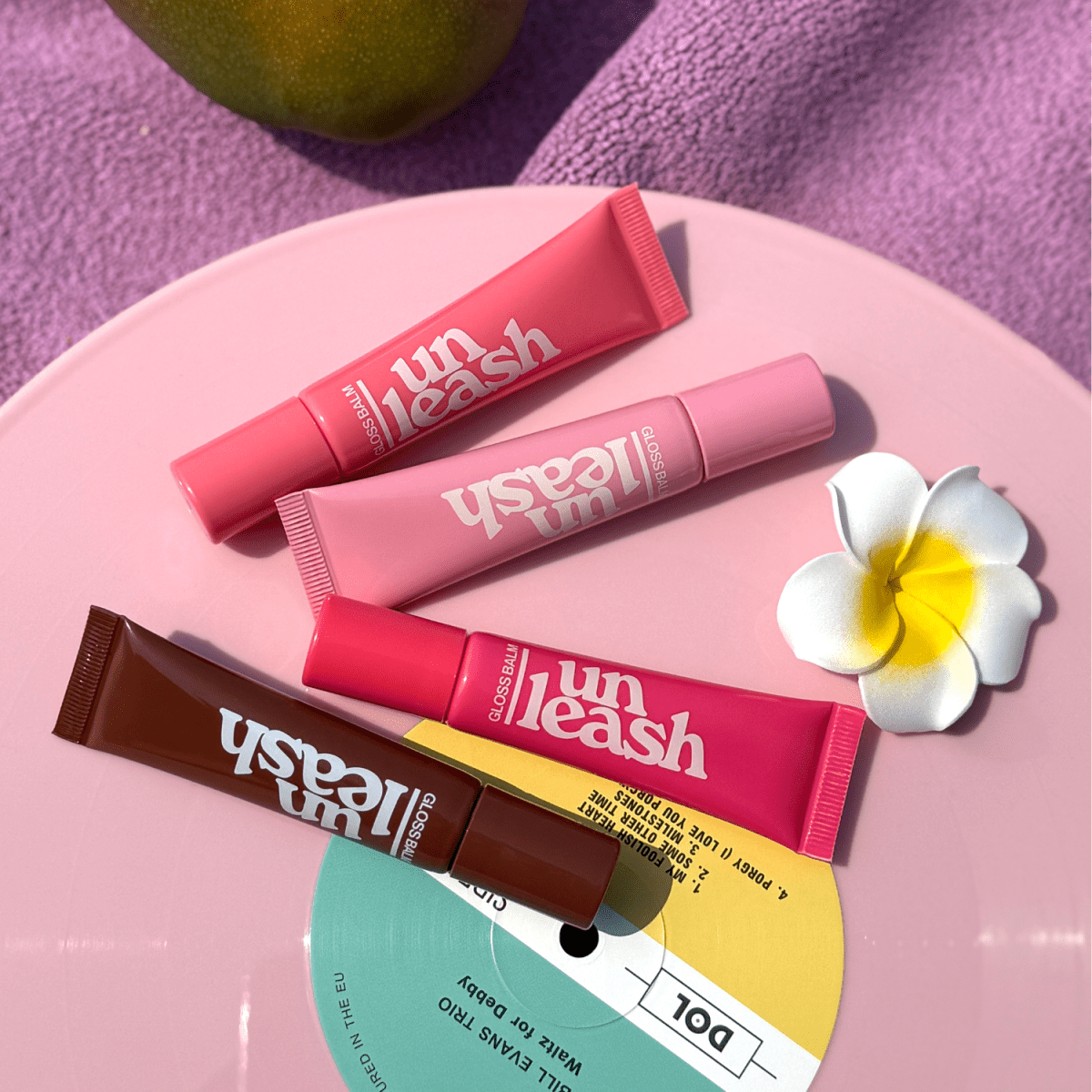 Unleashia Sunset Dazzle Gloss Balm | La Cosmetique