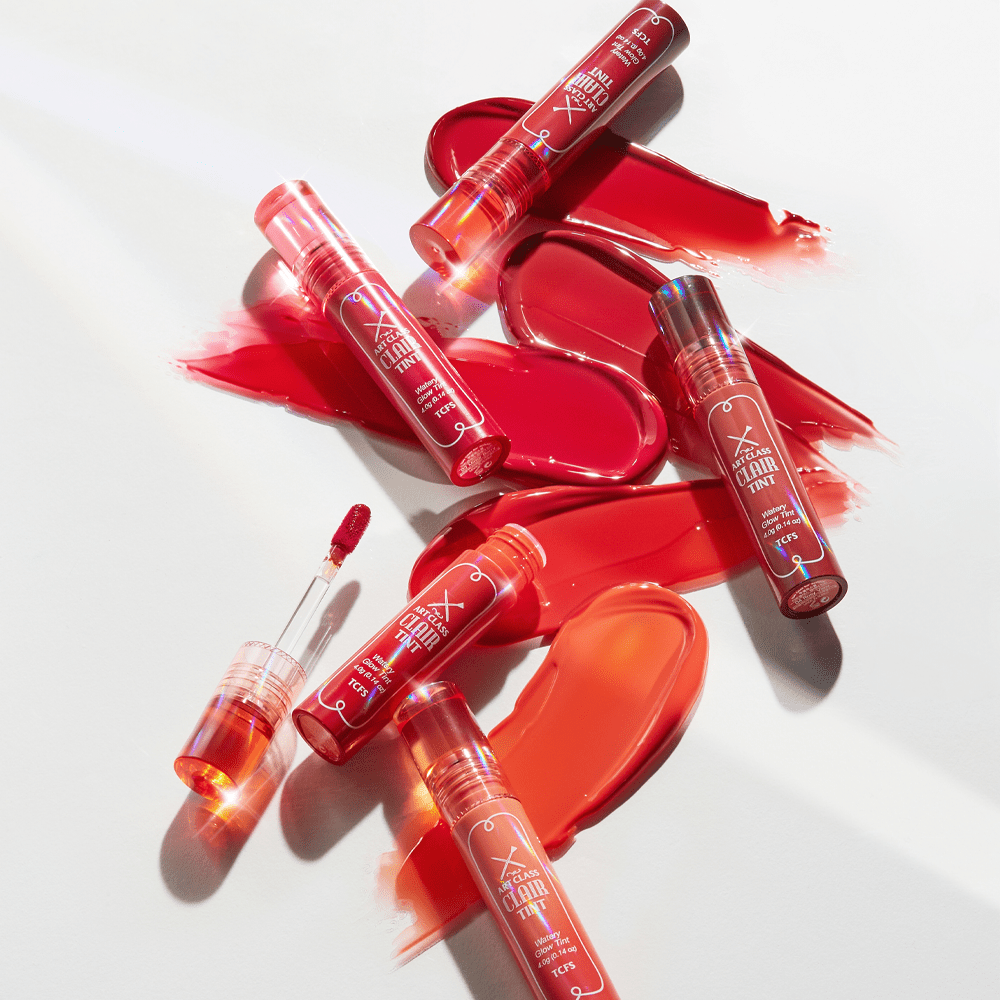 Too Cool For School Artclass Clair Tint lip tint in five vibrant colors, showcasing glossy, natural-looking lip shades.