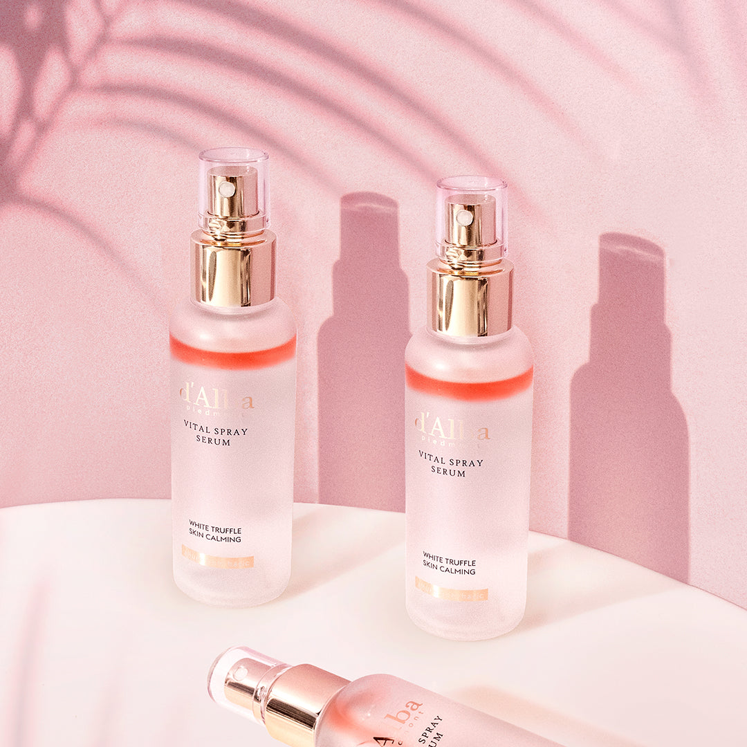 d'Alba White Truffle Vital Spray Serum bottle, 100ml, with sleek white packaging and a pump dispenser, on a clean background