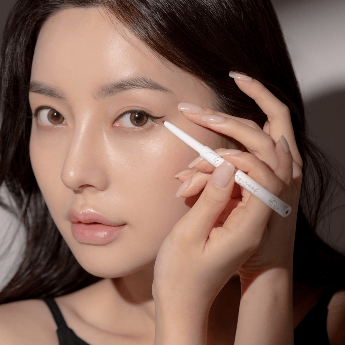 B.O.M Wonderproof Gel Slim Eyeliner in black, featuring a sleek applicator and smooth gel formula for precise eye lining.