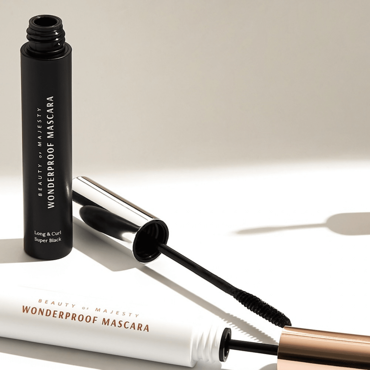 B.O.M Wonderproof Mascara Long & Curl showing a close-up of the mascara wand and curled lashes with long, defined eyelashes.