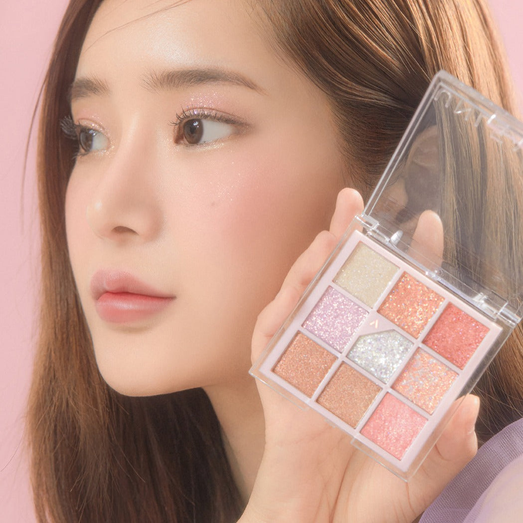 Unleashia Glitterpedia Eye Palette with 7 colorful eyeshadows in various glitter shades, perfect for creative eye makeup looks.