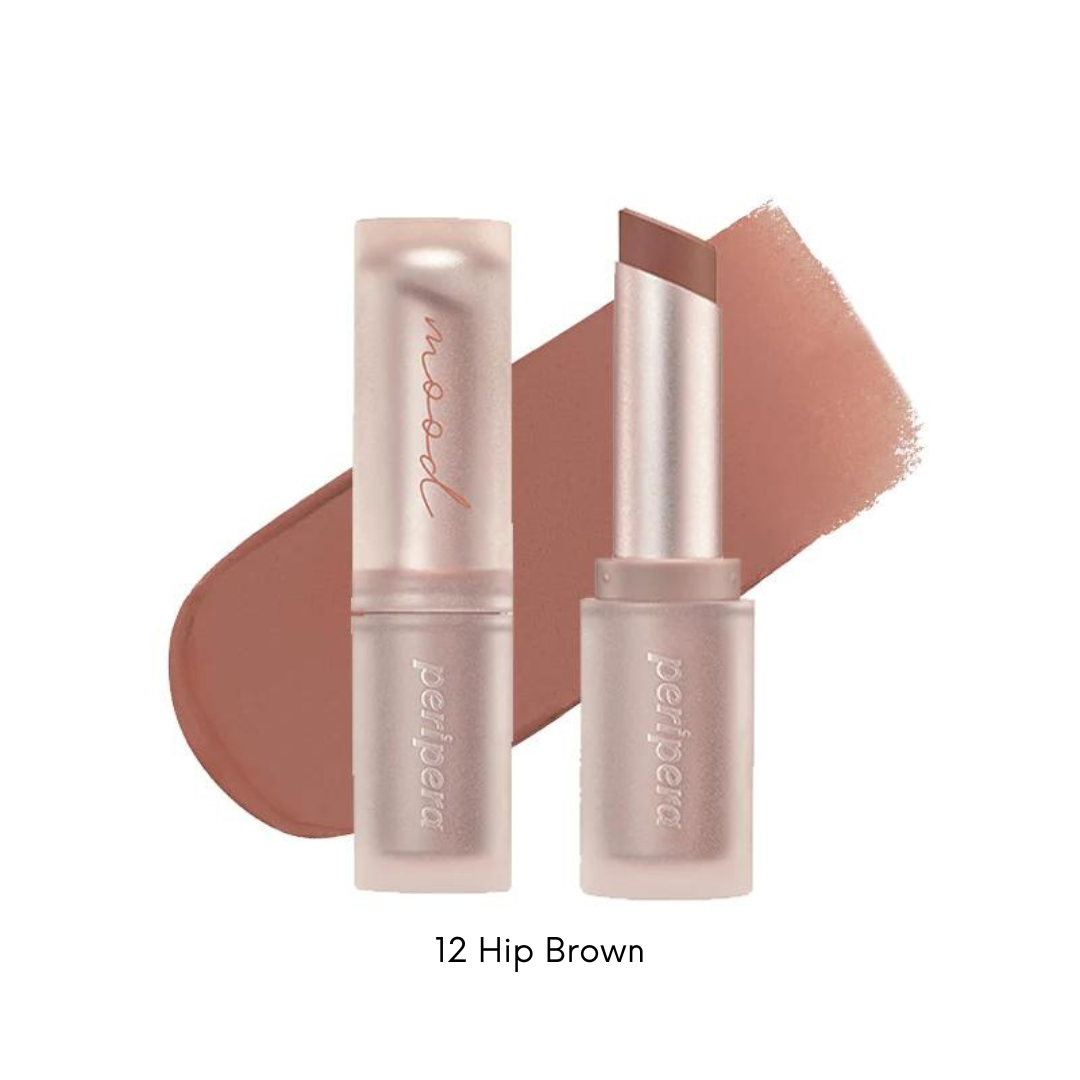 Peripera Ink Mood Matte Stick lipstick in a soft pink shade, showcasing smooth, matte lipstick application on lips.