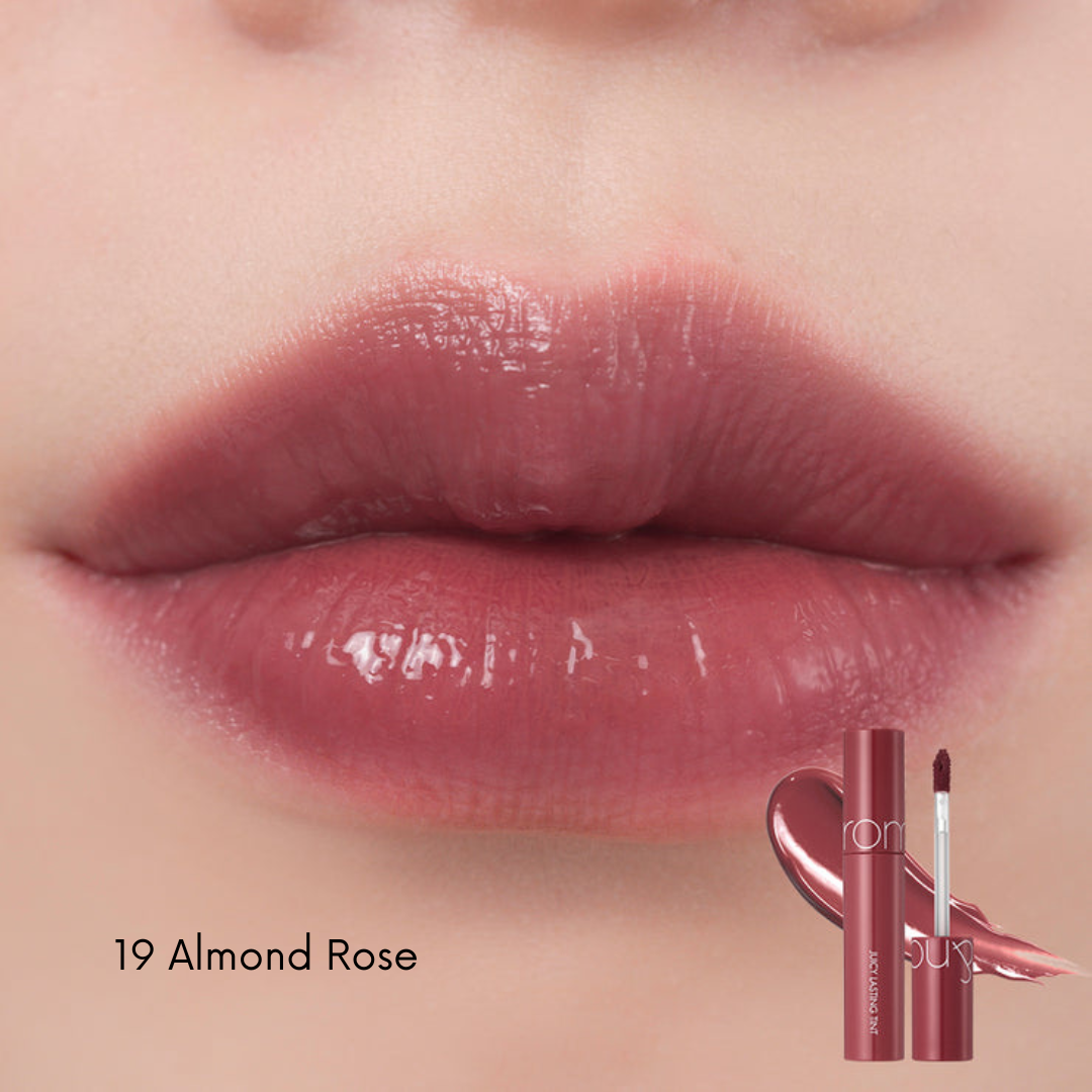Rom&nd Juicy Lasting Tint lip tint tube with applicator and vibrant color showcasing the product on a neutral background.