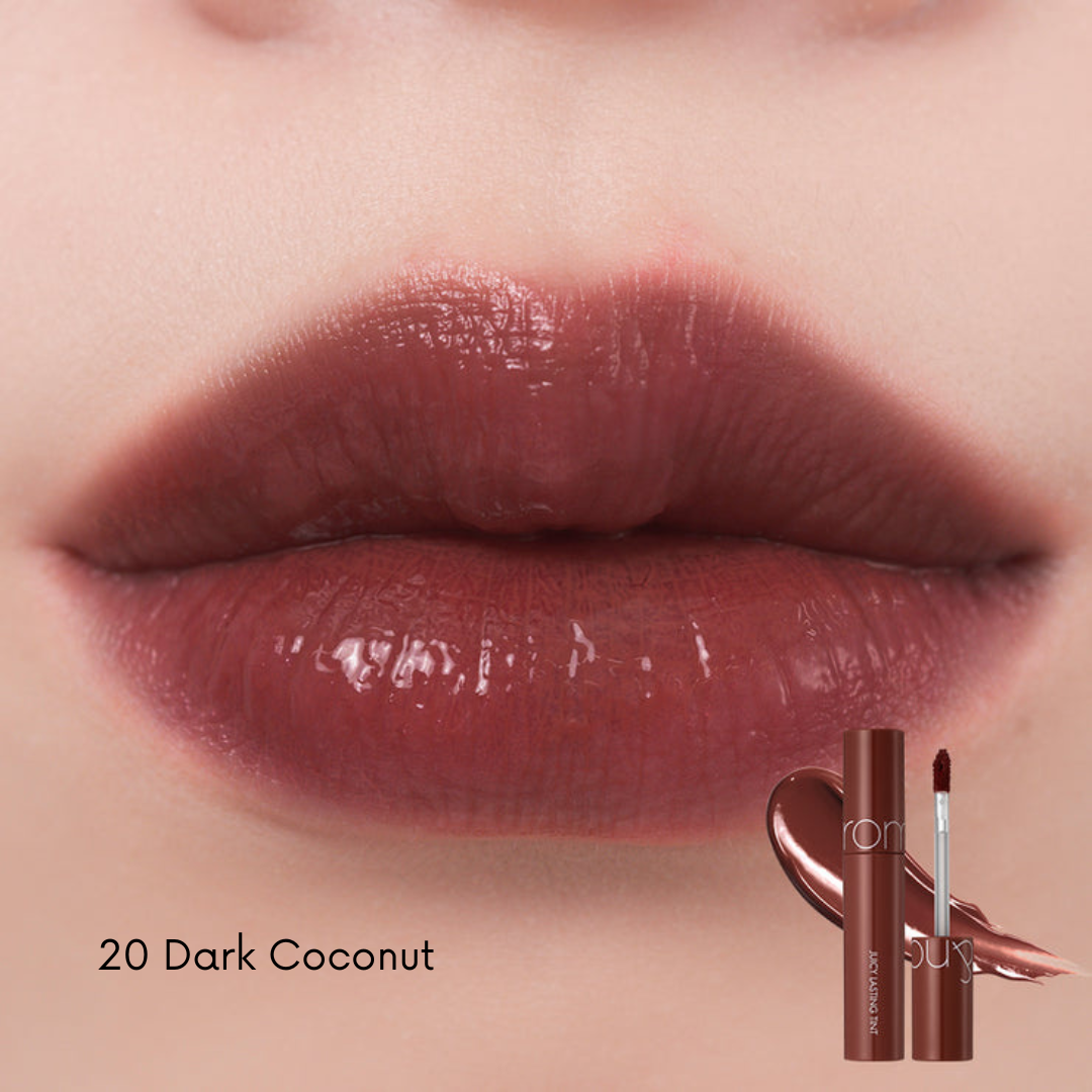 Rom&nd Juicy Lasting Tint lip tint in a vibrant shade, showing the slim tube and applicator with the tinted product inside.