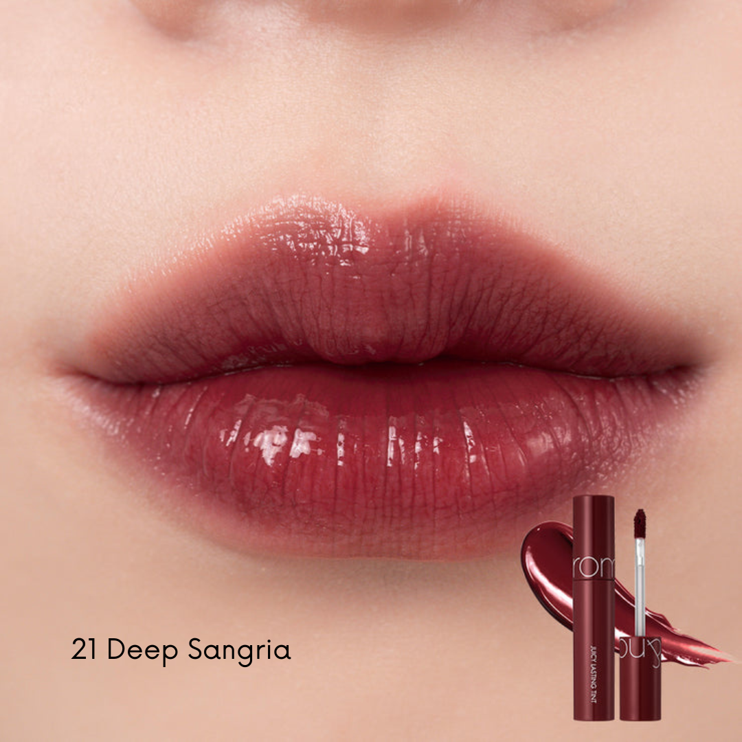 Rom&nd Juicy Lasting Tint lip tint in a vibrant shade, showing a close-up of the tinted lips with smooth, glossy finish.