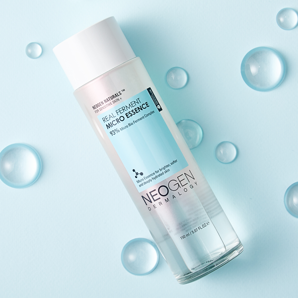 NEOGEN Real Ferment Micro Essence in a 150ml bottle, clear liquid with a minimalist label, designed for skincare.