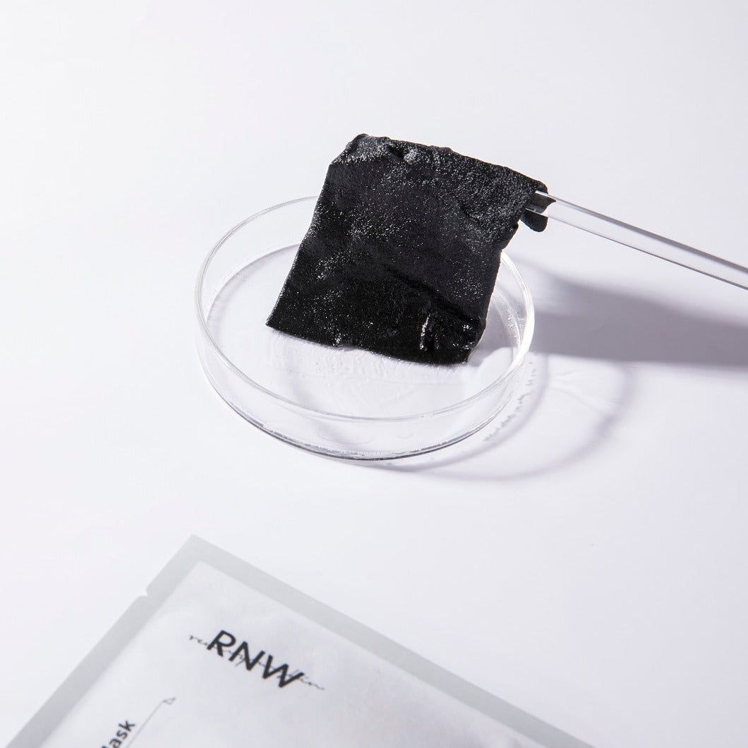 RNW Premium Charcoal Mineral Sheet Mask showing a black sheet mask with charcoal mineral ingredients for deep cleansing and skin detox.