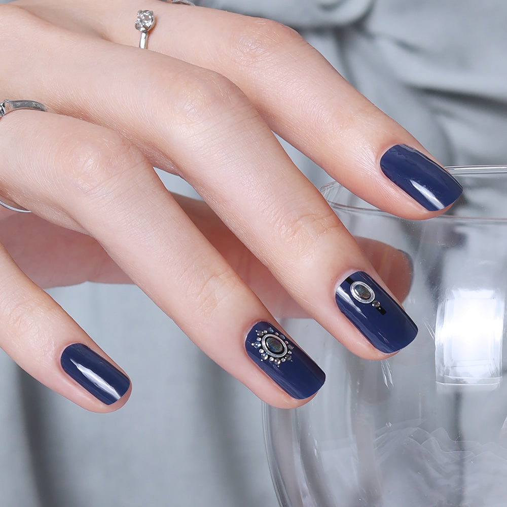 Glossy Blossom To Infinity gel nail strips applied on nails, showcasing vibrant, starry galaxy-inspired nail art design.