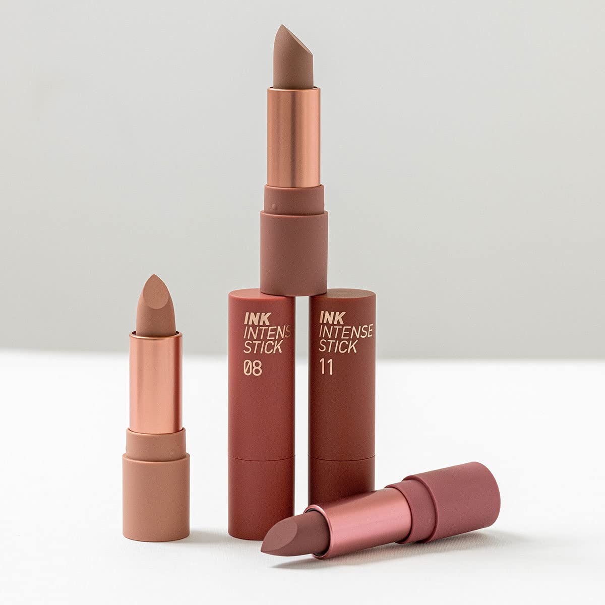 Peripera Ink Velvet Intense Stick lipstick in shade 51D8XyfTo9L, featuring a smooth, velvety finish in a sleek tube