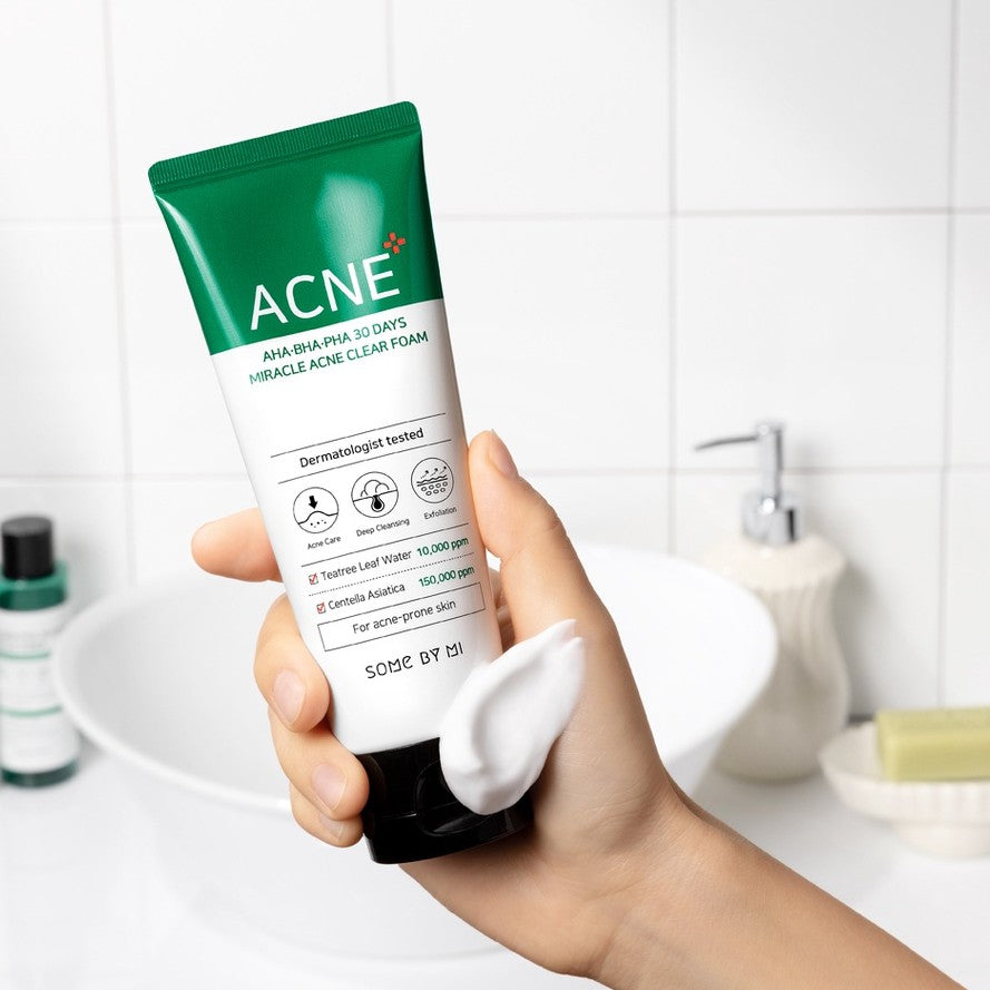 Some By Mi AHA BHA PHA 30 Days Miracle Acne Clear Foam cleanser in a 100ml tube, showing the product's packaging and label.