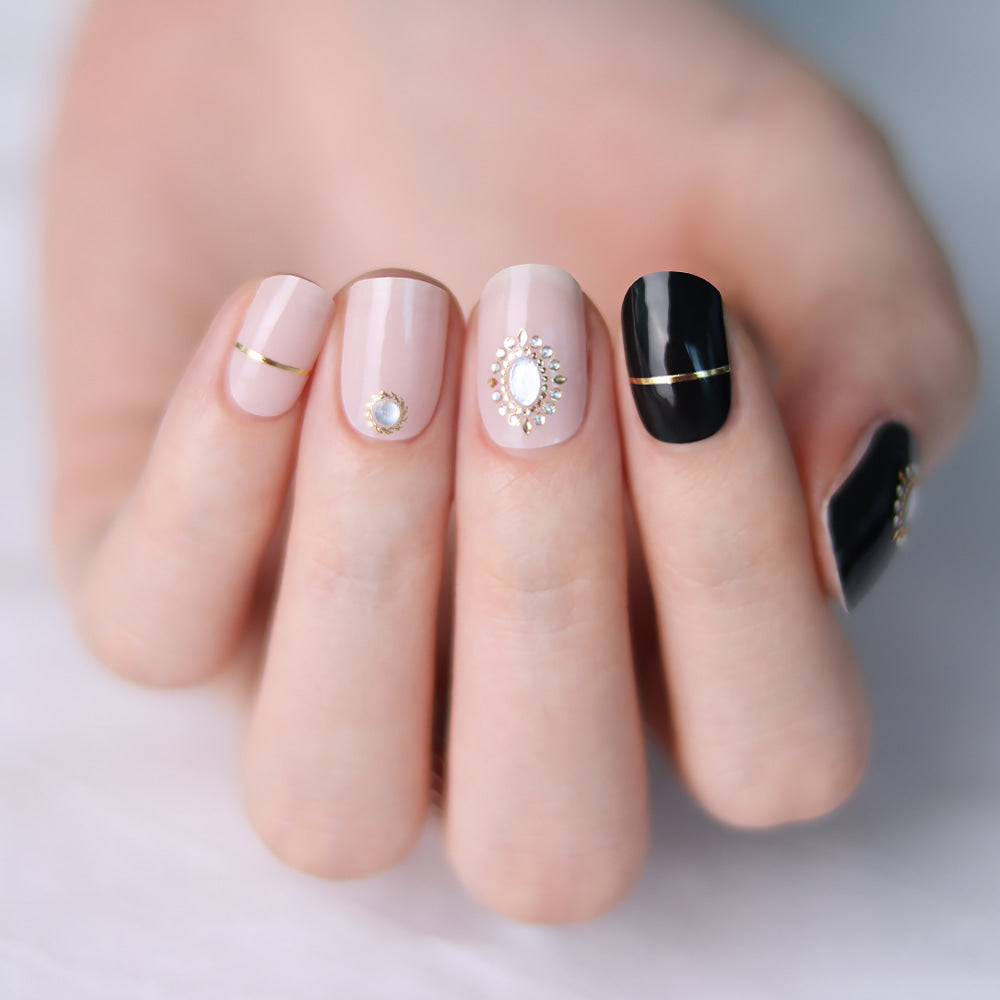 Glossy Blossom Bold Stone gel nail strips on nails with a textured, stone-inspired design for a stylish manicure.