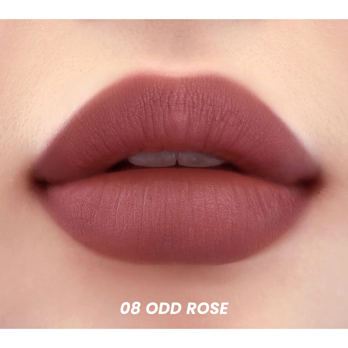 Peripera Ink Velvet Intense Stick lipstick in a vibrant shade, with a smooth, velvety bullet and sleek packaging.