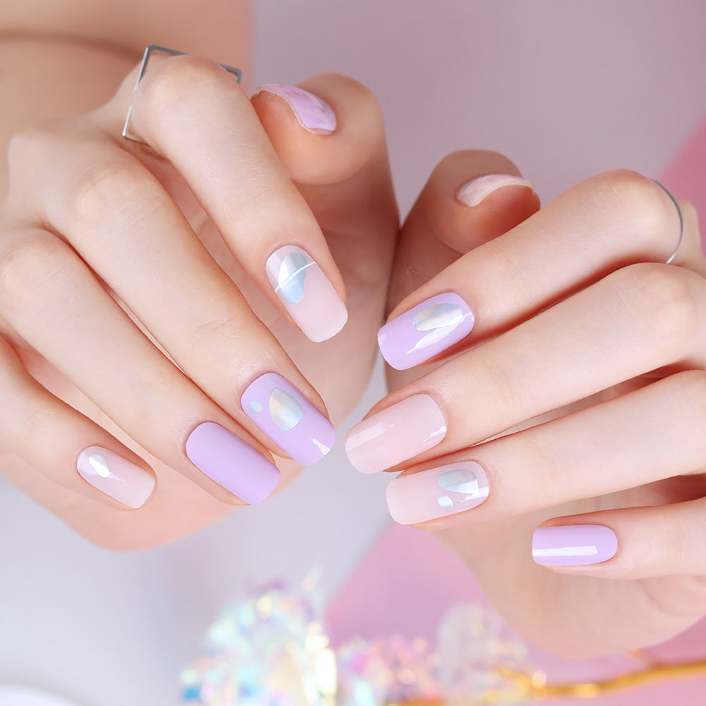 Glossy Blossom metallic purple gel nail strips on neatly manicured nails with a shiny finish.