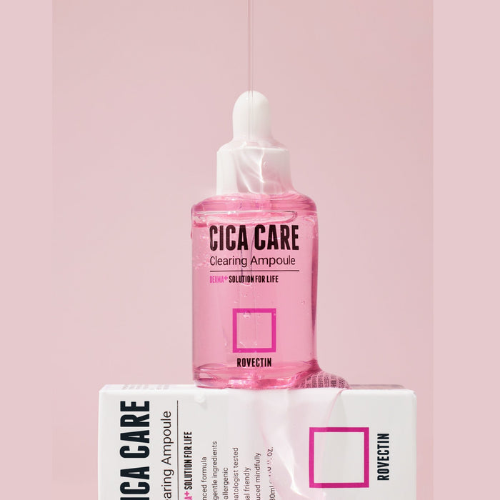 Rovectin Cica Care Clearing Ampoule 30ml, clear glass bottle with dropper for skin soothing and repair, close-up view.