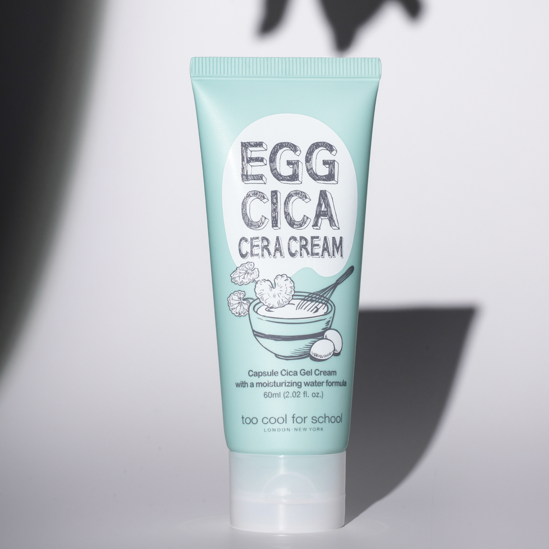 Too Cool For School Egg Cica Cera Cream 60ml face moisturizer jar with a smooth, creamy texture and minimalist packaging.