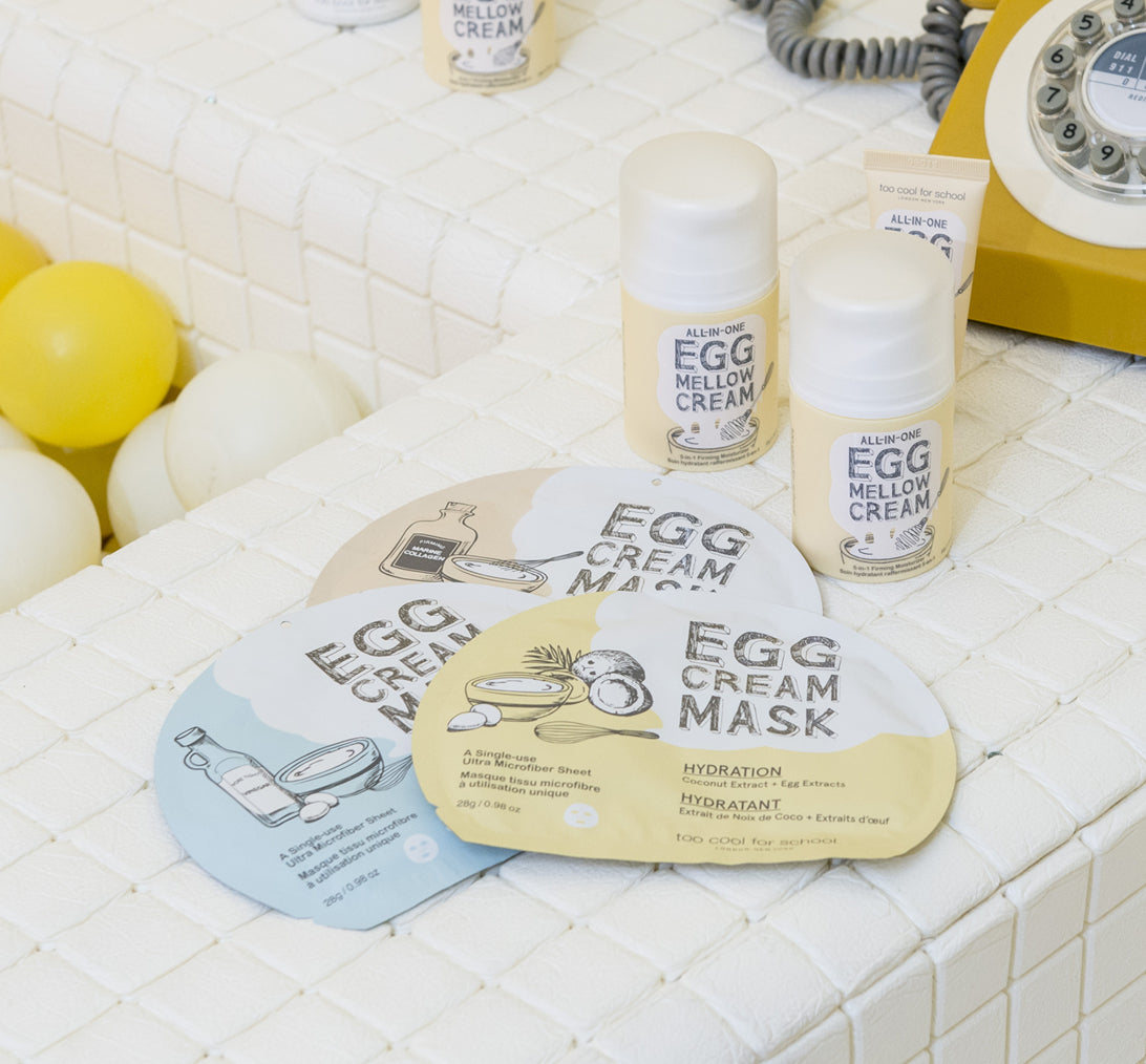 Too Cool For School Egg Cream Mask sheet mask with egg-inspired design for firming skincare, displayed on a clean background.