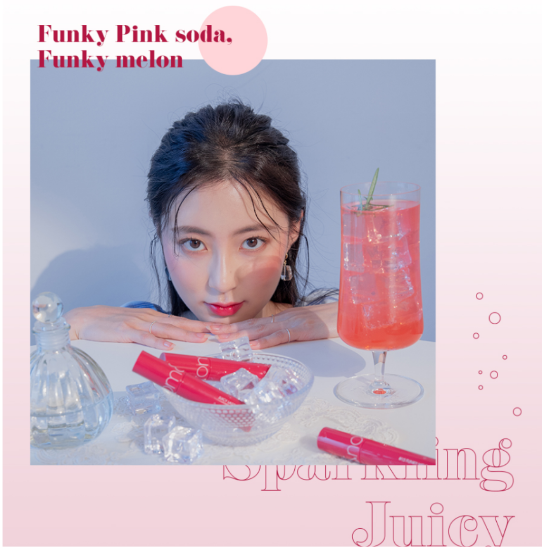 Rom&nd Juicy Lasting Tint lip tint with vibrant color, showing smooth, glossy lips in a close-up image.