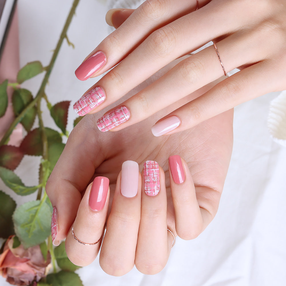 Glossy Blossom Rose Tweed gel nail strips on nails, showcasing elegant floral and textured design for stylish manicures.