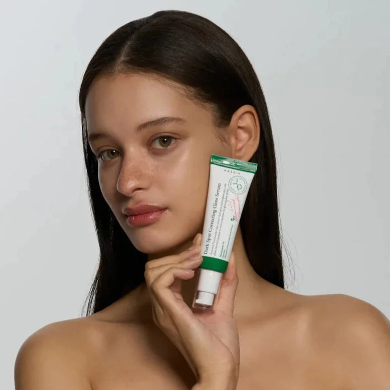 AXIS-Y Dark Spot Correcting Glow Serum 50ml bottle with dropper for brightening and reducing dark spots on skin
