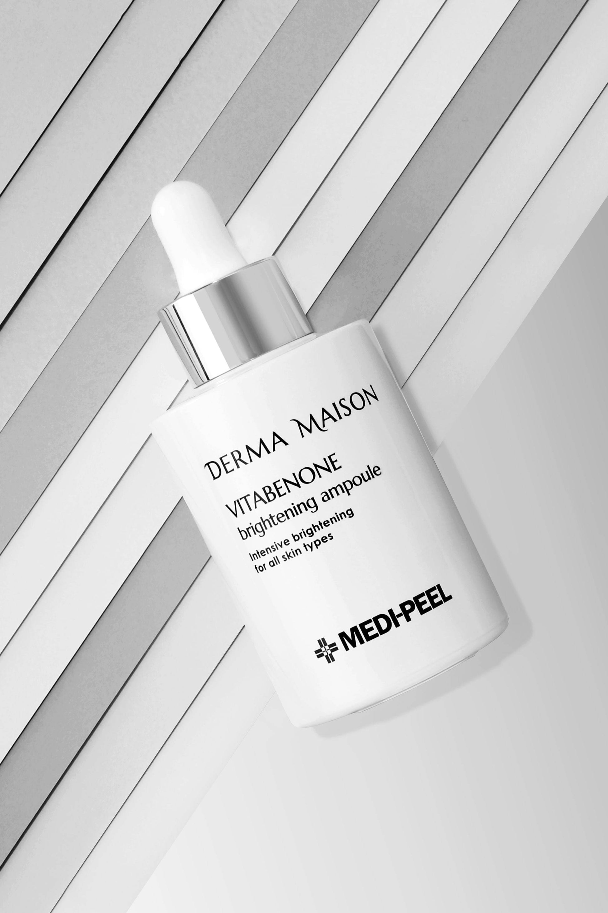 Derma Maison Vitabenone Brightening Ampoule 100ml bottle with dropper for radiant skin and skin brightening.