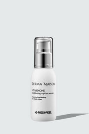 Derma Maison Vitabenone Brightening Capture Serum bottle, clear serum in a sleek container with a white cap.