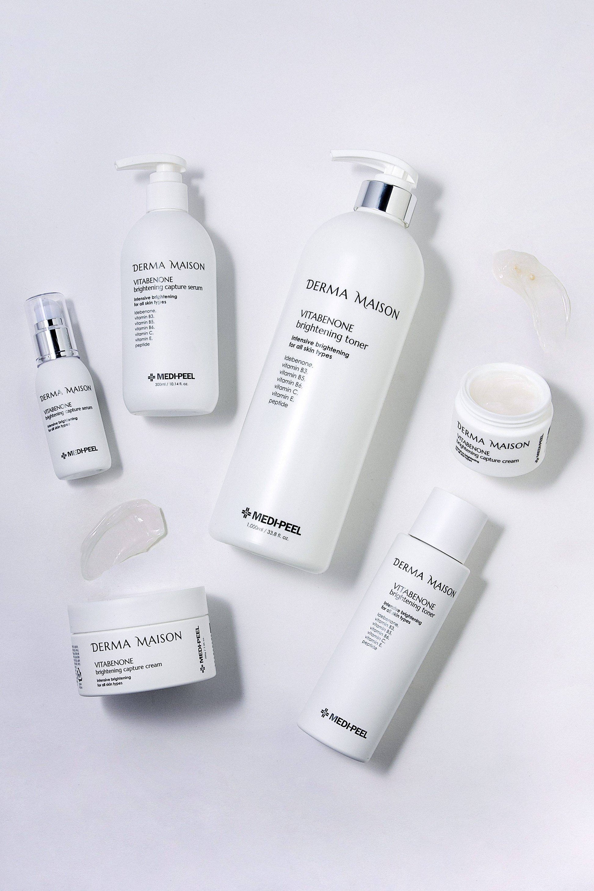 Derma Maison Vitabenone Brightening Capture Serum in a sleek bottle, featuring a dropper for precise application.