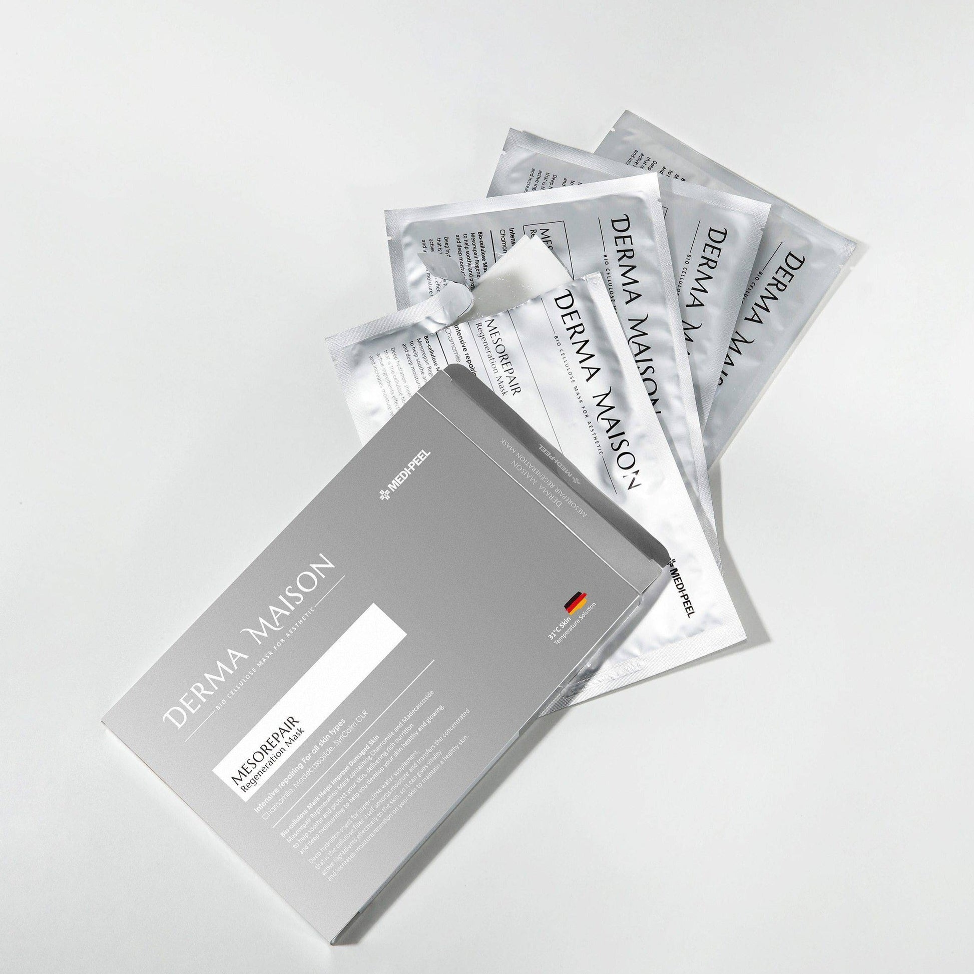 Set of five Derma Maison Mesorepair Regeneration Sheet Masks for skin renewal and hydration, in individual packaging.