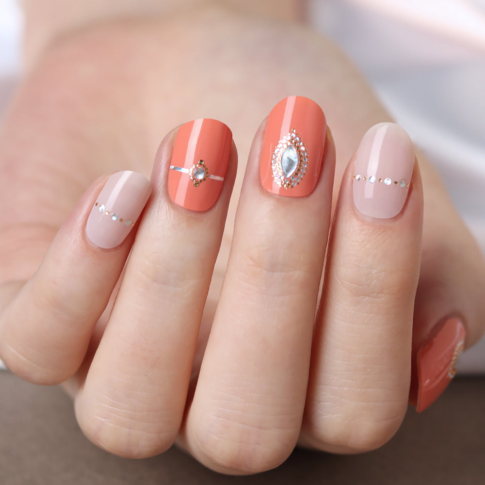 Glossy Blossom Christon gel nail strips applied on nails, showcasing a sleek, glossy finish and stylish design.