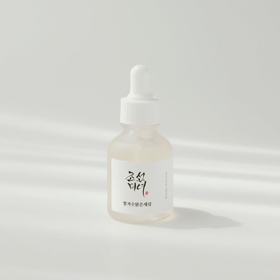 Beauty of Joseon Glow Serum with rice and alpha-arbutin in a 30ml bottle, featuring a dropper for skincare application.