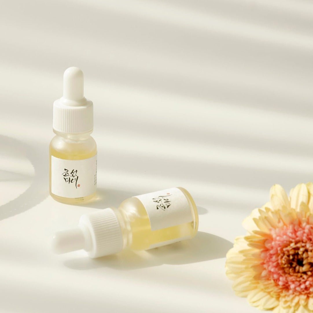 Beauty of Joseon Glow Serum with Propolis and Niacinamide featuring a sleek glass container and dropper applicator.