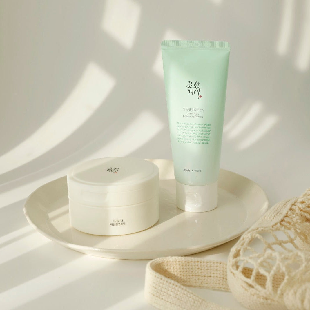 Beauty of Joseon Green Plum Refreshing Cleanser gel and foam cleanser in a clear bottle with green plum illustration